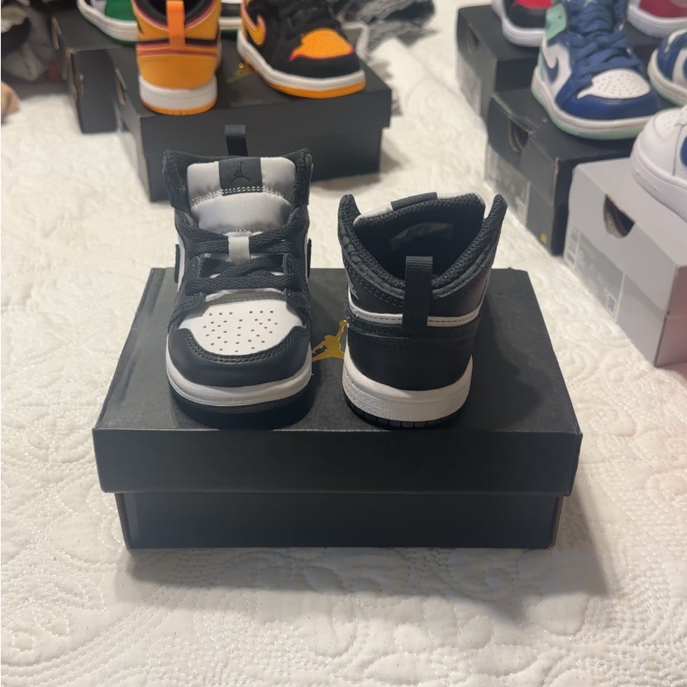 Jordan Black and White High-Top Sneakers